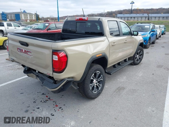 2024 GMC Canyon 4WD AT4 with VIN 1GTP6DEK8R1179023, listed as a IAAI auction lot 40930724 with 3,235 mi miles. Bid and sale history available at carsss.com. Image 4.
