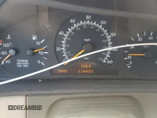1997 Mercedes-Benz E-Class with VIN WDBJF72F0VA189407, listed as a Copart auction lot 76073234 with 114,692 mi miles and Salvage Title. Bid and sale history available at carsss.com. Image 9.