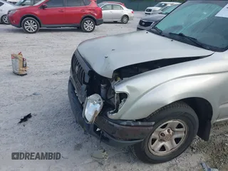 2003 Toyota Tacoma with VIN 5TENL42N63Z199086, listed as a IAAI auction lot 42084151 with 153,977 mi miles and . Bid and sale history available at DreamBid. Image 6.