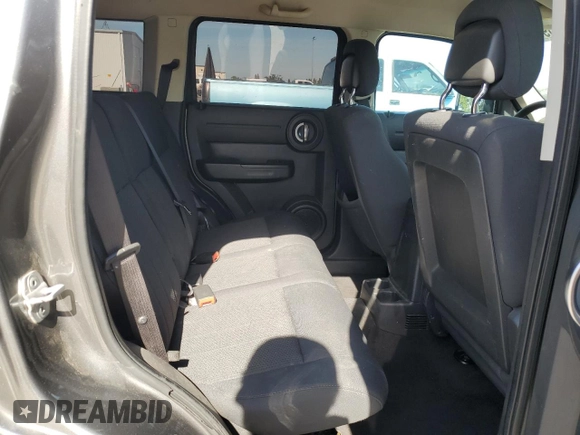 2011 Dodge Nitro Heat z VIN 1D4PT4GK8BW605665, wystawiony jako Copart lot #56986705 z przebiegiem 216 699 mil mil oraz Szkody całkowita. Historia ofert i sprzedaży dostępna na DreamBid. Obrazek 11.
