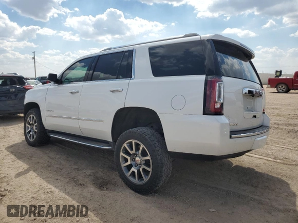2016 GMC Yukon Denali with VIN 1GKS2CKJ5GR282446, listed as a Copart auction lot 68660254 with 122,751 mi miles and Salvage Title. Bid and sale history available at carsss.com. Image 2.