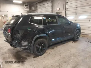 2019 Volkswagen Atlas SE with VIN 1V2LR2CAXKC599542, listed as a IAAI auction lot 41628588 with 59,377 mi miles and . Bid and sale history available at DreamBid. Image 4.