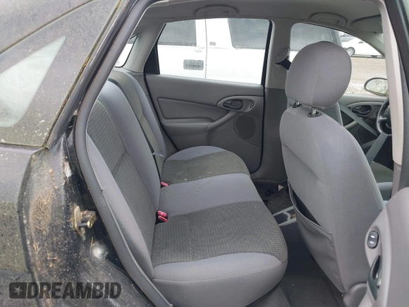 2004 Ford Focus SE with VIN 1FAFP34394W114485, listed as a IAAI auction lot 42737378 with 104,817 mi miles and . Bid and sale history available at DreamBid. Image 8.