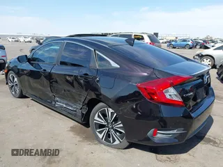 2018 Honda Civic EX-T z VIN 19XFC1F35JE200003, wystawiony jako IAAI lot #42393392 z przebiegiem 90 337 mil mil oraz . Historia ofert i sprzedaży dostępna na DreamBid. Obrazek 6.