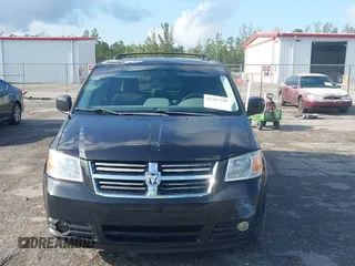 2010 Dodge Grand Caravan SXT with VIN 2D4RN5D17AR256493, listed as a IAAI auction lot 42187799 with 248,421 mi miles and . Bid and sale history available at DreamBid. Image 6.