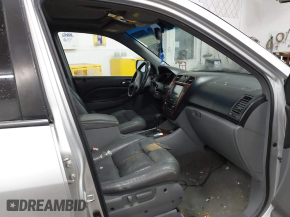 2005 Acura MDX Touring z VIN 2HNYD18855H511787, wystawiony jako IAAI lot #41709466 z przebiegiem 199 147 mil mil oraz . Historia ofert i sprzedaży dostępna na DreamBid. Obrazek 5.