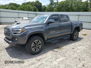 2023 Toyota Tacoma SR with VIN 3TMCZ5AN3PM561522, listed as a Copart auction lot 61037515 with 18,408 mi miles and Salvage title. Bid and sale history available at DreamBid. Image 1.