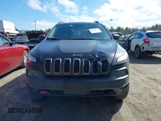 2014 Jeep Cherokee Trailhawk with VIN 1C4PJMBS3EW127749, listed as a IAAI auction lot 41836617 with 207,002 mi miles and . Bid and sale history available at DreamBid. Image 12.