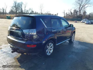 2010 Mitsubishi Outlander GT with VIN JA4JT5AX3AZ015815, listed as a IAAI auction lot 41517180 with 122,020 mi miles. Bid and sale history available at carsss.com. Image 4.