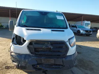 2020 Ford Transit Cargo with VIN 1FTYE1Y84LKB43188, listed as a IAAI auction lot 41388755 with 254,023 mi miles and . Bid and sale history available at DreamBid. Image 13.