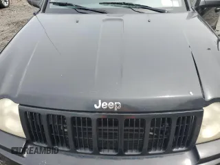 2007 Jeep Grand Cherokee Laredo z VIN 1J8GR48K47C681735, wystawiony jako Copart lot #59006435 z przebiegiem 195 517 mil mil oraz Nie do naprawy • Non repairable. Historia ofert i sprzedaży dostępna na DreamBid. Obrazek 12.