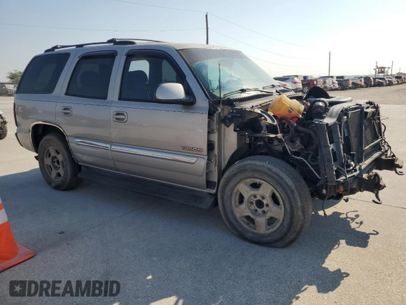 2004 GMC Yukon SLE z VIN 1GKEC13V64R277493, wystawiony jako Copart lot #68819754 z przebiegiem 125 731 mil mil oraz Szkoda całkowita • Salvage title. Historia ofert i sprzedaży dostępna na DreamBid. Obrazek 4.