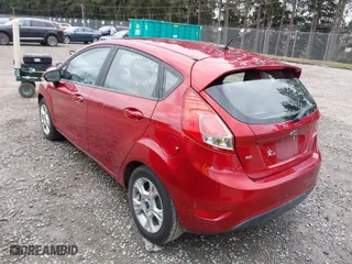 2016 Ford Fiesta SE with VIN 3FADP4EJ3GM198611, listed as a IAAI auction lot 41819332 with 122,700 mi miles. Bid and sale history available at carsss.com. Image 3.