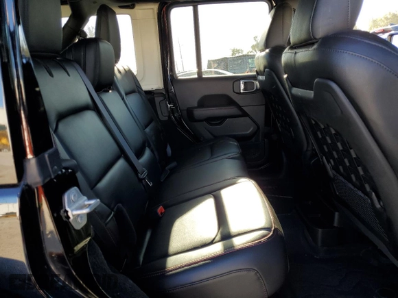 2023 Jeep Wrangler Rubicon z VIN 1C4HJXFN3PW618061, wystawiony jako Copart lot #81957524 z przebiegiem 25 880 mil mil oraz Szkoda całkowita • Salvage title. Historia ofert i sprzedaży dostępna na DreamBid. Obrazek 11.