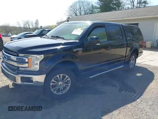 2019 Ford F-150 XL with VIN 1FTEW1E57KFB26841, listed as a IAAI auction lot 42097395 with 83,072 mi miles and . Bid and sale history available at DreamBid. Image 2.
