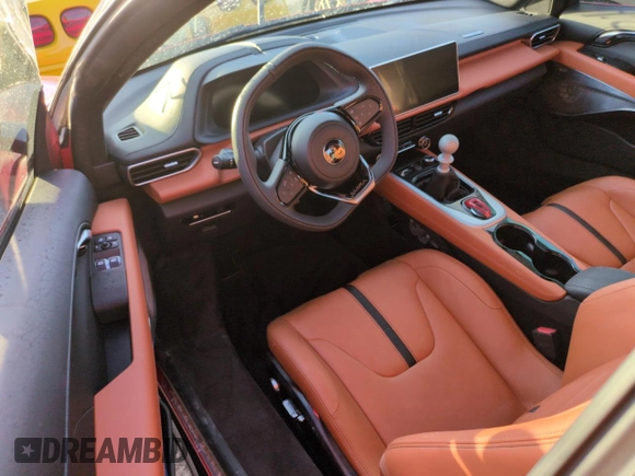 2024 Lotus Emira First Edition z VIN SCCLEKAX7RHB12137, wystawiony jako Copart lot #74508424 z przebiegiem Nie podano mil oraz Nie do naprawy. Historia ofert i sprzedaży dostępna na DreamBid. Obrazek 8.