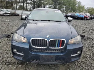 2013 BMW X6 xDrive35i z VIN 5UXFG2C55DL788611, wystawiony jako Copart lot #50972395 z przebiegiem 131 755 mil mil oraz Szkoda całkowita • Salvage title. Historia ofert i sprzedaży dostępna na DreamBid. Obrazek 5.