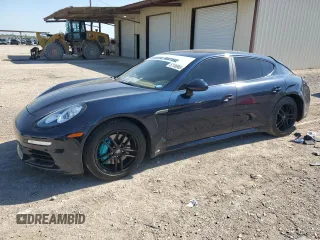 2016 Porsche Panamera 4 z VIN WP0AA2A74GL000679, wystawiony jako Copart lot #52186965 z przebiegiem 82 468 mil mil oraz Szkoda całkowita • Salvage title. Historia ofert i sprzedaży dostępna na DreamBid. Obrazek 1.