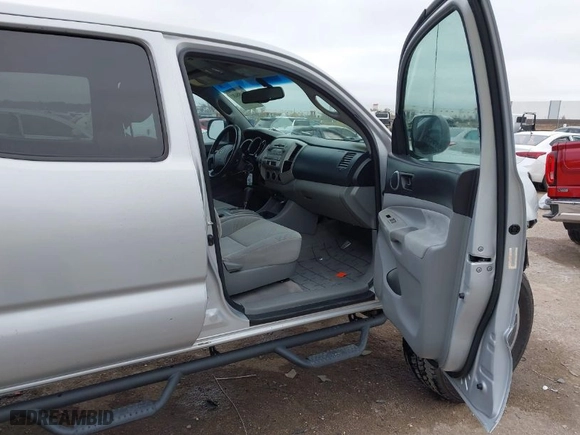 2011 Toyota Tacoma with VIN 3TMLU4ENXBM057058, listed as a IAAI auction lot 41088682 with 187,596 mi miles. Bid and sale history available at carsss.com. Image 5.