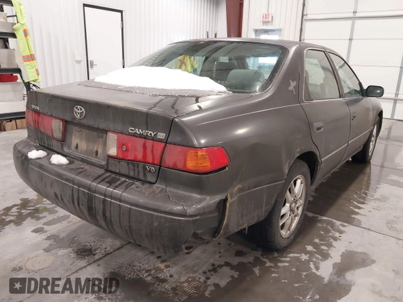 2001 Toyota Camry LE z VIN JT2BF28K110307972, wystawiony jako IAAI lot #41652522 z przebiegiem 201 631 mil mil oraz . Historia ofert i sprzedaży dostępna na DreamBid. Obrazek 4.