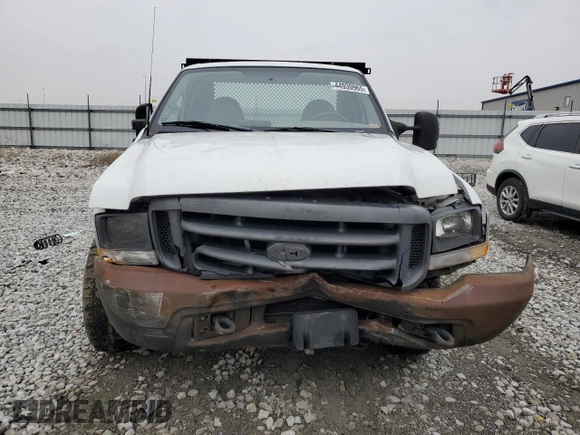 1999 Ford Super Duty F-250 XL with VIN 1FTNF20L1XEC34865, listed as a Copart auction lot 44930965 with 493,500 mi miles and Salvage Title. Bid and sale history available at carsss.com. Image 5.