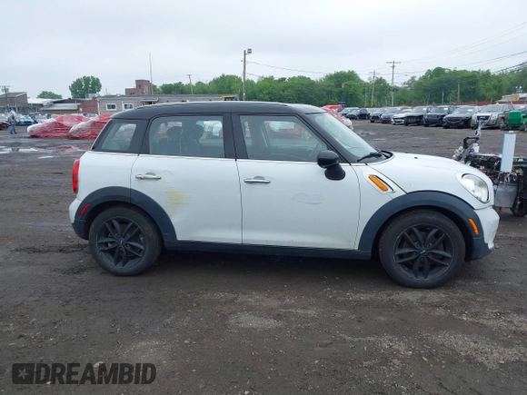 2013 MINI Countryman with VIN WMWZB3C53DWM08244, listed as a IAAI auction lot 42281364 with 139,894 mi miles and . Bid and sale history available at DreamBid. Image 13.