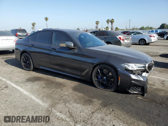 2022 BMW 5 Series M550i xDrive z VIN WBA13BK03NCK95022, wystawiony jako Copart lot #58600105 z przebiegiem 34 142 mil mil oraz Szkoda całkowita • Salvage title. Historia ofert i sprzedaży dostępna na DreamBid. Obrazek 4.