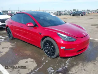 2021 Tesla Model 3 Long Range with VIN 5YJ3E1EB2MF015279, listed as a IAAI auction lot 41765428 with 55,486 mi miles. Bid and sale history available at carsss.com. Image 1.
