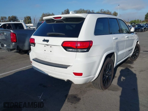 2019 Jeep Grand Cherokee Laredo with VIN 1C4RJEAG0KC858177, listed as a IAAI auction lot 42604812 with 79,932 mi miles and . Bid and sale history available at DreamBid. Image 4.