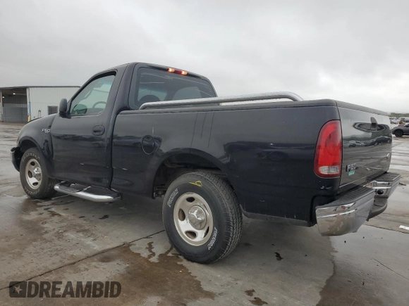 2000 Ford F-150 XL with VIN 3FTZF1728YMA63732, listed as a Copart auction lot 80010344 with Not provided miles and Salvage title. Bid and sale history available at DreamBid. Image 2.