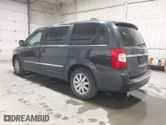 2014 Chrysler Town & Country Touring with VIN 2C4RC1BG8ER300882, listed as a IAAI auction lot 42068878 with 161,002 mi miles and . Bid and sale history available at DreamBid. Image 3.