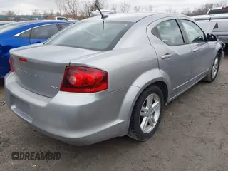 2013 Dodge Avenger SXT with VIN 1C3CDZCB2DN665997, listed as a IAAI auction lot 42011394 with Not Provided miles and . Bid and sale history available at carsss.com. Image 4.