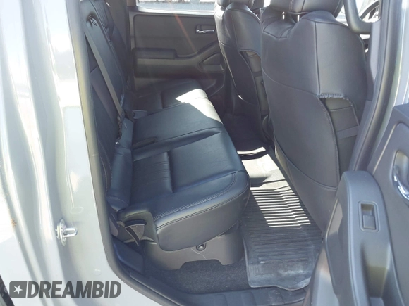 2022 Nissan Frontier SV z VIN 1N6ED1EKXNN659026, wystawiony jako IAAI lot #42050476 z przebiegiem 26 183 mil mil oraz . Historia ofert i sprzedaży dostępna na DreamBid. Obrazek 8.