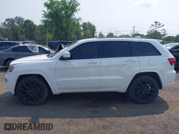 2020 Jeep Grand Cherokee Laredo E with VIN 1C4RJFAG5LC375033, listed as a IAAI auction lot 42415231 with 62,489 mi miles and . Bid and sale history available at DreamBid. Image 14.