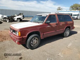 1991 Oldsmobile Bravada z VIN 1GHDT13Z0M2705443, wystawiony jako Copart lot #77072004 z przebiegiem Nie podano mil oraz Tytuł czysty. Historia ofert i sprzedaży dostępna na DreamBid. Obrazek 1.
