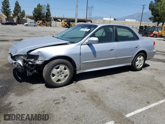 2002 Honda Accord EX z VIN 1HGCG16582A001090, wystawiony jako Copart lot #58244785 z przebiegiem 99 158 mil mil oraz Szkoda całkowita • Salvage title. Historia ofert i sprzedaży dostępna na DreamBid. Obrazek 1.