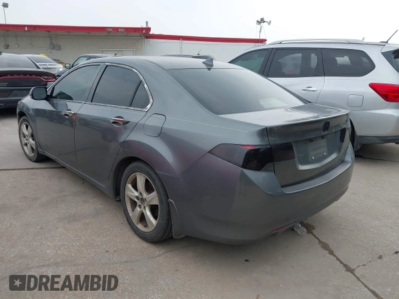 2010 Acura TSX with VIN JH4CU2F66AC030515, listed as a IAAI auction lot 42286692 with 208,099 mi miles and . Bid and sale history available at DreamBid. Image 3.