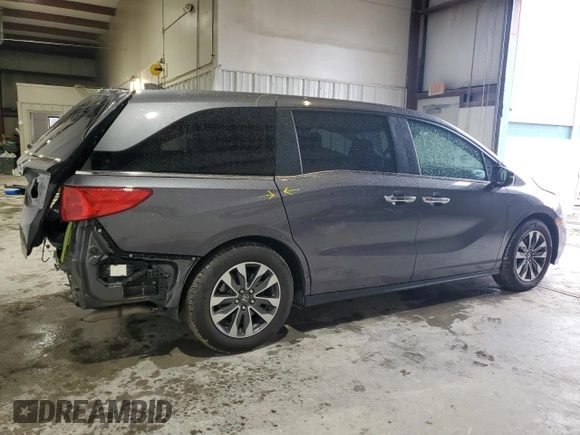 2022 Honda Odyssey EX-L with VIN 5FNRL6H74NB053215, listed as a Copart auction lot 54205895 with 57,958 mi miles and Salvage Title. Bid and sale history available at DreamBid. Image 3.