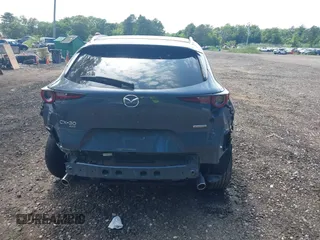 2023 Mazda CX-30 S Preferred z VIN 3MVDMBCM4PM558181, wystawiony jako IAAI lot #42589333 z przebiegiem 12 384 mil mil oraz . Historia ofert i sprzedaży dostępna na DreamBid. Obrazek 16.