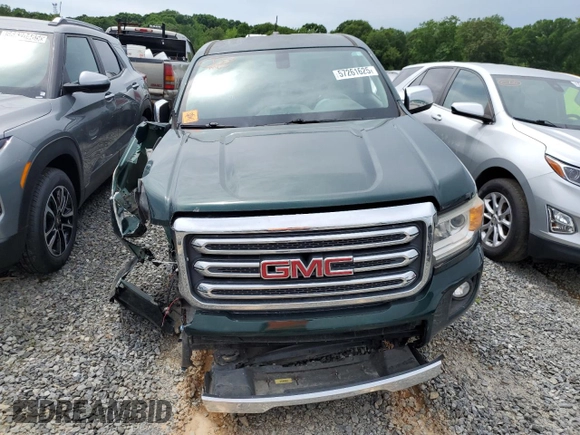 2016 GMC Canyon 4WD SLT z VIN 1GTG6DE31G1286565, wystawiony jako Copart lot #57261625 z przebiegiem 85 664 mil mil oraz Tytuł czysty. Historia ofert i sprzedaży dostępna na DreamBid. Obrazek 5.
