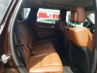 2015 Jeep Grand Cherokee Summit with VIN 1C4RJFJTXFC661574, listed as a Copart auction lot 65592954 with 110,791 mi miles and Salvage Title. Bid and sale history available at carsss.com. Image 11.