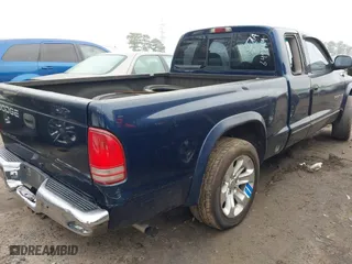 2002 Dodge Dakota SLT with VIN 1B7GL42X72S649714, listed as a IAAI auction lot 41426396 with 227,056 mi miles. Bid and sale history available at carsss.com. Image 4.