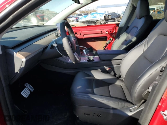 2023 Tesla Model Y Performance with VIN 7SAYGDEFXPF790747, listed as a Copart auction lot 42233855 with 25,452 mi miles and Salvage Title. Bid and sale history available at DreamBid. Image 7.