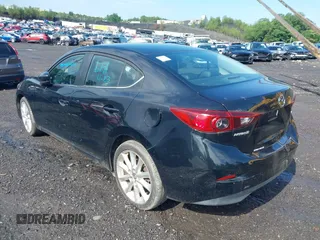 2017 Mazda 3 Touring z VIN 3MZBN1V74HM128575, wystawiony jako IAAI lot #42731487 z przebiegiem 136 553 mil mil oraz . Historia ofert i sprzedaży dostępna na DreamBid. Obrazek 3.
