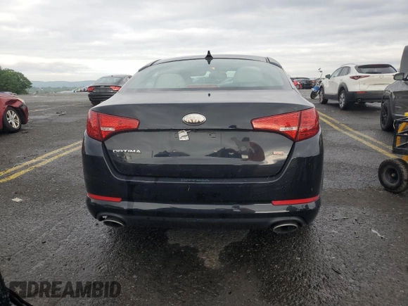 2013 Kia Optima LX z VIN 5XXGM4A72DG175781, wystawiony jako Copart lot #58235885 z przebiegiem 180 949 mil mil oraz Szkody całkowita. Historia ofert i sprzedaży dostępna na DreamBid. Obrazek 6.