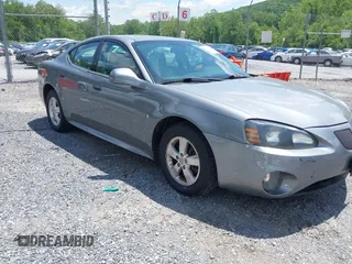 2007 Pontiac Grand Prix z VIN 2G2WP552671197613, wystawiony jako IAAI lot #42331835 z przebiegiem 182 200 mil mil oraz . Historia ofert i sprzedaży dostępna na DreamBid. Obrazek 1.