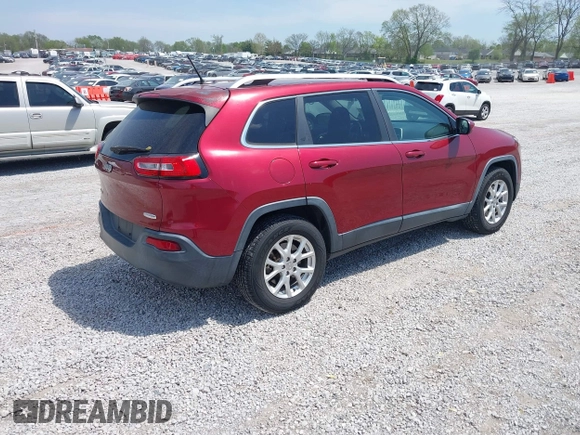 2014 Jeep Cherokee Altitude with VIN 1C4PJMCB7EW185958, listed as a IAAI auction lot 42002583 with 118,256 mi miles and . Bid and sale history available at DreamBid. Image 4.