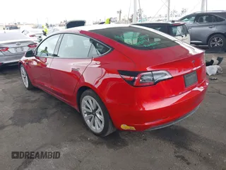 2022 Tesla Model 3 with VIN 5YJ3E1EA8NF177409, listed as a IAAI auction lot 41740718 with 25,557 mi miles. Bid and sale history available at carsss.com. Image 3.