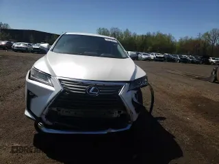 2016 Lexus RX 350 z VIN 2T2BZMCA3GC012763, wystawiony jako Copart lot #54926255 z przebiegiem 58 693 mil mil oraz Szkoda całkowita • Salvage title. Historia ofert i sprzedaży dostępna na DreamBid. Obrazek 14.