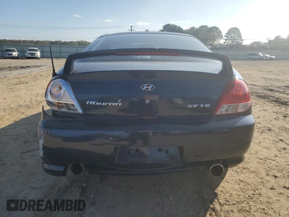 2005 Hyundai Tiburon GT z VIN KMHHN65F85U158764, wystawiony jako Copart lot #80060884 z przebiegiem 121 747 mil mil oraz Czysty tytuł • Clean title. Historia ofert i sprzedaży dostępna na DreamBid. Obrazek 6.